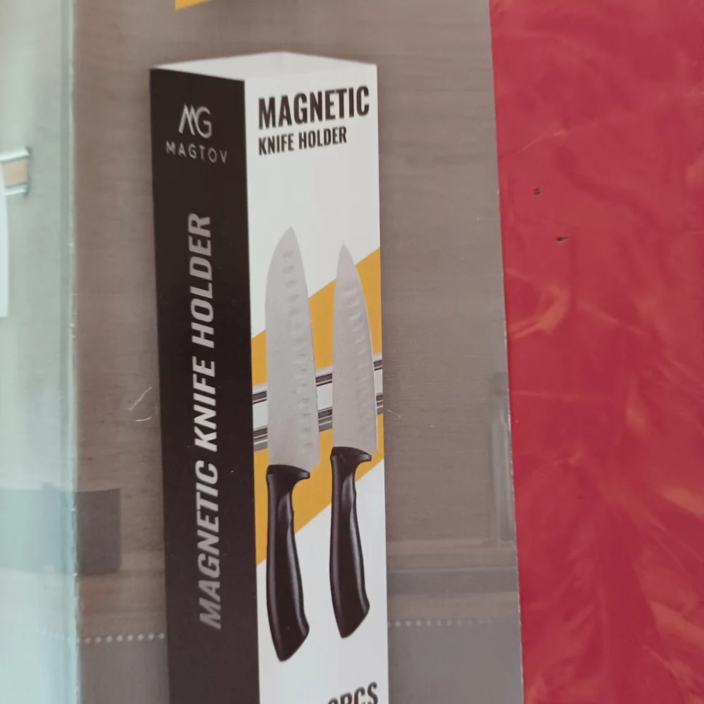 Magnetic knife and utensil hanger